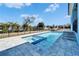 A beautiful pool and jacuzzi are the focal points of this backyard oasis at 6542 Simone Shores Cir, Apollo Beach, FL 33572