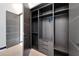 Large walk-in closet with ample shelving and hanging space at 6542 Simone Shores Cir, Apollo Beach, FL 33572