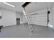 Garage with attic access via pull-down stairs at 6542 Simone Shores Cir, Apollo Beach, FL 33572
