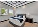 Bright bedroom with two windows, plush bedding, and modern decor at 6542 Simone Shores Cir, Apollo Beach, FL 33572