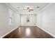 Bright and spacious room with hardwood floors and natural light coming in through the windows with shutters at 4606 W Fig St # 4, Tampa, FL 33609