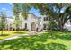 Well-manicured lawn of townhouses with a charming walkway and lush landscaping at 4606 W Fig St # 4, Tampa, FL 33609