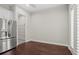Spacious kitchen features stainless refrigerator and access to a large walk-in pantry with custom shelving at 4606 W Fig St # 4, Tampa, FL 33609