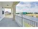Covered balcony overlooking a canal with views of other houses at 3431 Sheephead Dr, Hernando Beach, FL 34607
