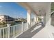 White balcony overlooking the peaceful waterfront at 3431 Sheephead Dr, Hernando Beach, FL 34607