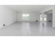 Spacious unfinished basement with large windows and high ceilings at 3431 Sheephead Dr, Hernando Beach, FL 34607