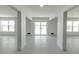 Unfinished basement with large windows and high ceilings at 3431 Sheephead Dr, Hernando Beach, FL 34607