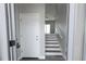 Bright entryway with staircase leading to the second floor at 3431 Sheephead Dr, Hernando Beach, FL 34607