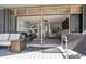 Open living space with sliding doors leading to a deck at 5030 N Beach Rd # 2, Englewood, FL 34223