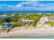 Aerial view of beachfront property showing home's location and surroundings at 5030 N Beach Rd # 2, Englewood, FL 34223