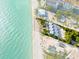 Aerial view showcasing beachfront home with private beach access and surrounding neighborhood at 5030 N Beach Rd # 2, Englewood, FL 34223