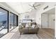 Bright and airy main bedroom with access to a private balcony at 5030 N Beach Rd # 2, Englewood, FL 34223