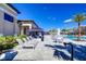 Relaxing poolside lounge area with comfortable seating at 32588 Tree Of Life Ave, Wesley Chapel, FL 33543