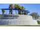 Community entrance with a large water feature and Winding Ridge signage at 32588 Tree Of Life Ave, Wesley Chapel, FL 33543