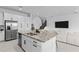 Modern kitchen with stainless steel appliances and granite countertops at 32588 Tree Of Life Ave, Wesley Chapel, FL 33543