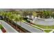 Community entrance with landscaping and water feature at 32588 Tree Of Life Ave, Wesley Chapel, FL 33543