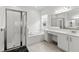 Spa-like bathroom with soaking tub, shower, and double vanity at 32588 Tree Of Life Ave, Wesley Chapel, FL 33543