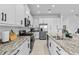 Modern kitchen with granite countertops and ample cabinet space at 32588 Tree Of Life Ave, Wesley Chapel, FL 33543