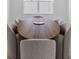 Dining room with an oval wood table and six gray chairs at 32588 Tree Of Life Ave, Wesley Chapel, FL 33543