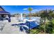 Enjoy the resort-style pool with comfortable lounge chairs at 32588 Tree Of Life Ave, Wesley Chapel, FL 33543