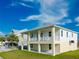 Two story house with a large back patio at 3431 Sheephead Dr, Hernando Beach, FL 34607