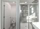 Modern bathroom with walk-in shower and separate toilet area at 3431 Sheephead Dr, Hernando Beach, FL 34607