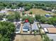 Aerial view of a single Gathering home with a solar panel system at 5224 Mango Fruit St, Seffner, FL 33584