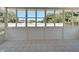 Sunroom featuring ample windows and backyard view at 5224 Mango Fruit St, Seffner, FL 33584