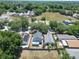 Aerial view of house and surrounding properties with solar panels at 5224 Mango Fruit St, Seffner, FL 33584
