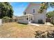 Rear view of house, showcasing sunroom and backyard at 5224 Mango Fruit St, Seffner, FL 33584