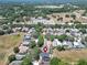 Aerial view of a house with solar panels in a residential neighborhood at 5224 Mango Fruit St, Seffner, FL 33584