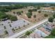 Aerial view showing a residential area with a park and open green space at 5224 Mango Fruit St, Seffner, FL 33584