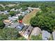 Aerial view of a house with solar panels, located in a quiet neighborhood at 5224 Mango Fruit St, Seffner, FL 33584