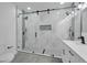 Large walk-in shower with glass enclosure and modern fixtures at 5224 Mango Fruit St, Seffner, FL 33584