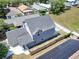 Aerial view of house, yard, and solar panels at 5224 Mango Fruit St, Seffner, FL 33584