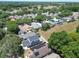 Aerial view of a neighborhood with various houses and lush green spaces at 5224 Mango Fruit St, Seffner, FL 33584