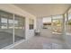 Sunroom with sliding glass doors and utility sink at 5224 Mango Fruit St, Seffner, FL 33584