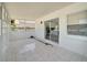 Bright sunroom with tile floors and view of backyard at 5224 Mango Fruit St, Seffner, FL 33584