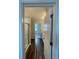 Clean bathroom with shower featuring sleek wood flooring and granite countertops at 462 Spotted Slipper Pl, Ruskin, FL 33570