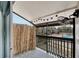 Covered balcony with outdoor fan and string lights at 1028 Apollo Beach Blvd # 27, Apollo Beach, FL 33572
