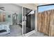 Glass sliding doors open to a private balcony at 1028 Apollo Beach Blvd # 27, Apollo Beach, FL 33572
