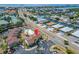 Aerial view showing condo location near pool and road at 1028 Apollo Beach Blvd # 27, Apollo Beach, FL 33572