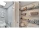 Bathroom with linen closet and wire shelving at 1028 Apollo Beach Blvd # 27, Apollo Beach, FL 33572