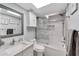 Updated bathroom with marble-look tile and a large vanity at 1028 Apollo Beach Blvd # 27, Apollo Beach, FL 33572