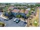 Aerial view of condo, parking and pool at 1028 Apollo Beach Blvd # 27, Apollo Beach, FL 33572