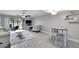 Open concept living room and dining area with light flooring at 1028 Apollo Beach Blvd # 27, Apollo Beach, FL 33572