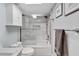 Clean bathroom with marble-look tile and a tub/shower combo at 1028 Apollo Beach Blvd # 27, Apollo Beach, FL 33572