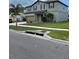 Two-story house with a two-car garage and landscaping at 462 Spotted Slipper Pl, Ruskin, FL 33570