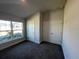 Spacious bedroom featuring double closets and a window at 36188 Welsh Glade Rd, Dade City, FL 33525