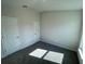 Bright bedroom with carpet and two doors and window at 36188 Welsh Glade Rd, Dade City, FL 33525